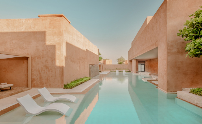 Villenblick auf den Poolbereich des Zulal Serenity, in Katar.